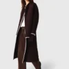 Abrigo reversible bordado Abrigo reversible bordado