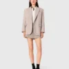 Blazer de traje a rayas con pedrería