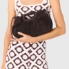 Bolso de mano Mipli con efecto bouclé Bolso de mano Mipli con efecto bouclé