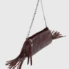 Bolso tipo riñonera Miss M de charol