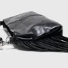 Bolso tipo riñonera Miss M de charol