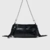 Bolso tipo riñonera Miss M de charol