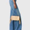 Bolso tipo riñonera Miss M Metallic