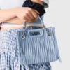 Bolso tote mini de piel acolchada