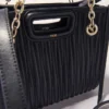 Bolso tote mini de piel acolchada