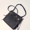 Bolso tote mini de piel acolchada