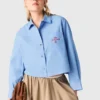 Camisa bordada con pliegues en la espalda