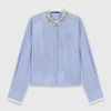 Camisa con cuello de joya desmontable Camisa con cuello de joya desmontable