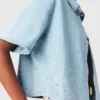 Camisa vaquera corta con pedrería