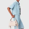 Camisa vaquera corta con pedrería