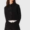 Chaqueta corta bordada