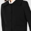 Chaqueta corta con cuello de piel desmontable