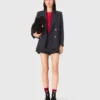 Chaqueta de traje con botones dorados