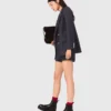 Chaqueta de traje con botones dorados