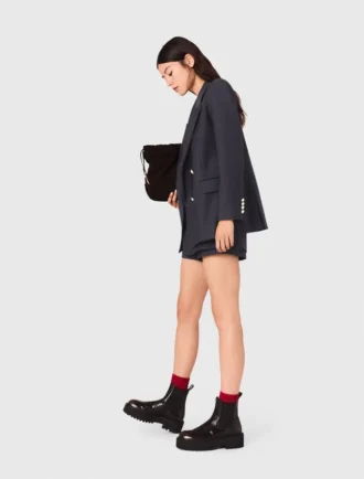 Chaqueta de traje con botones dorados