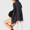 Chaqueta de traje con botones dorados