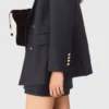 Chaqueta de traje con botones dorados