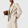 Chaqueta de traje con broche