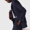 Chaqueta de traje con pliegues en la espalda