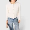 Chaqueta de tweed con ribete de perlas