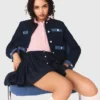 Chaqueta de tweed con ribetes de denim