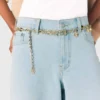 Cinturón de doble cadena con dijes