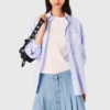 Falda corta de denim plisada con pedrería