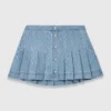 Falda corta de denim plisada con pedrería