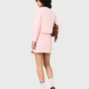 Falda corta de punto con pespuntes