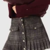 Falda corta plisada a cuadros Falda corta plisada a cuadros