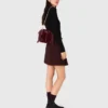 Falda plisada corta