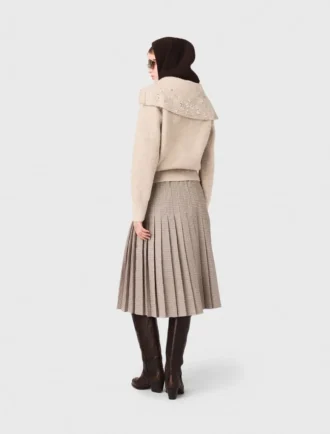 Jersey con pedrería y media cremallera