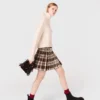 Kilt a cuadros con pedrería