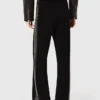 Pantalones con banda de strass