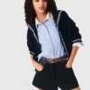 Pantalones cortos de tweed con detalles de denim