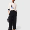 Pantalones de algodón con cinturón de cuero