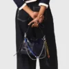 Pantalones de algodón con cinturón de cuero
