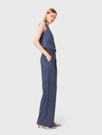 Pantalones de traje con pliegues y pedrería