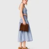 Top de algodón con smocks y pedrería