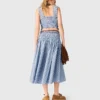 Top de algodón con smocks y pedrería