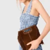 Top de algodón con smocks y pedrería