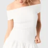 Top de cuello bardot de punto elástico