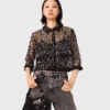 Top floral con lentejuelas