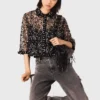 Top floral con lentejuelas