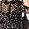 Top floral con lentejuelas