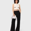 Top sin mangas de tweed con lurex