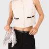 Top sin mangas de tweed con lurex