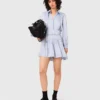 Vestido camisero fluido con tachuelas Vestido camisero fluido con tachuelas