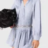 Vestido camisero fluido con tachuelas Vestido camisero fluido con tachuelas