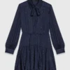 Vestido camisero fluido con tachuelas Vestido camisero fluido con tachuelas